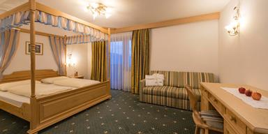 Superior Double Room with canopy bed and balcony