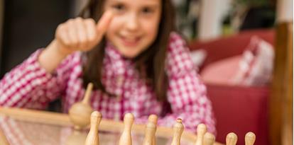 A girl playing Pachisi